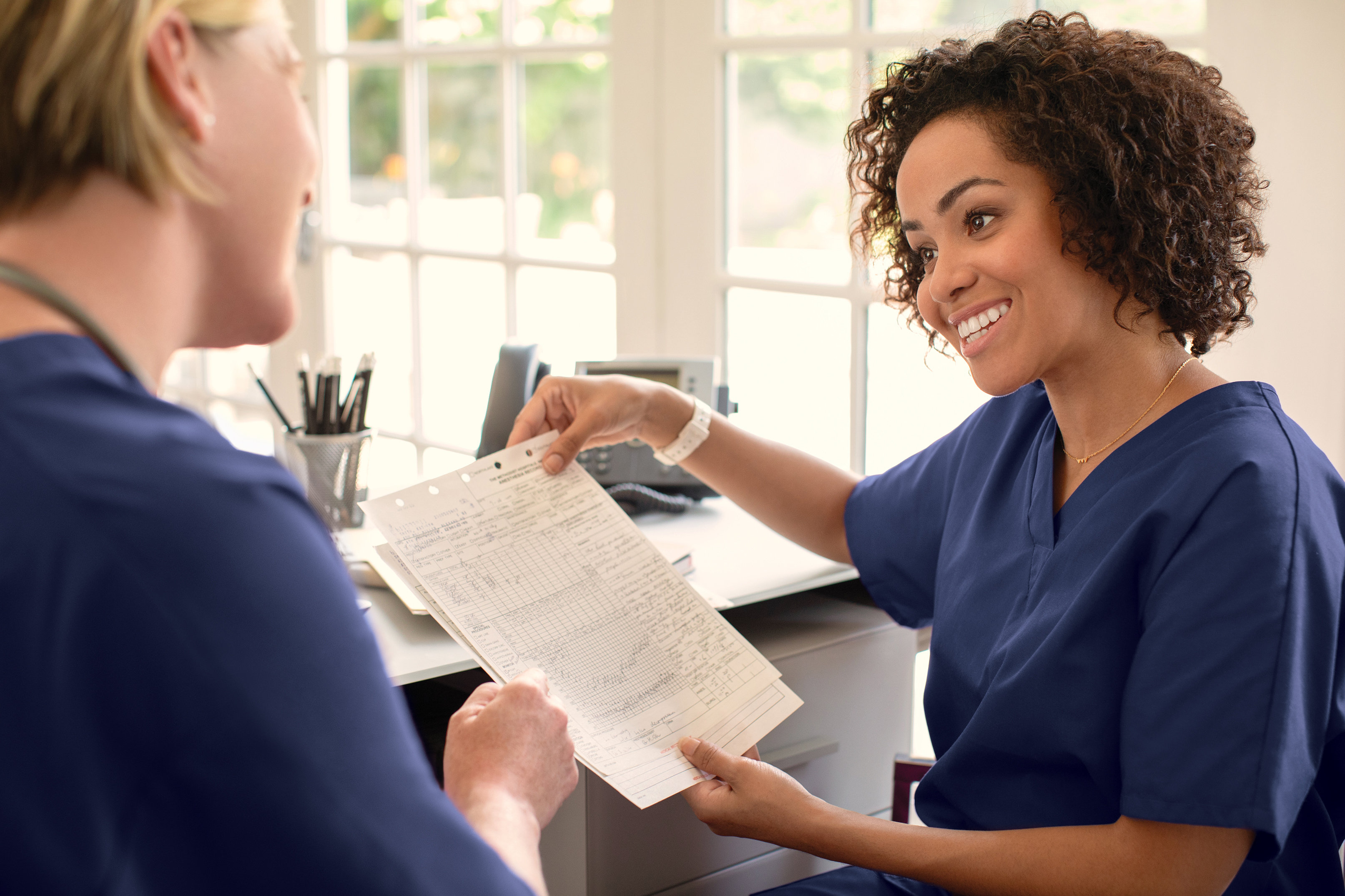 medical staff at desk