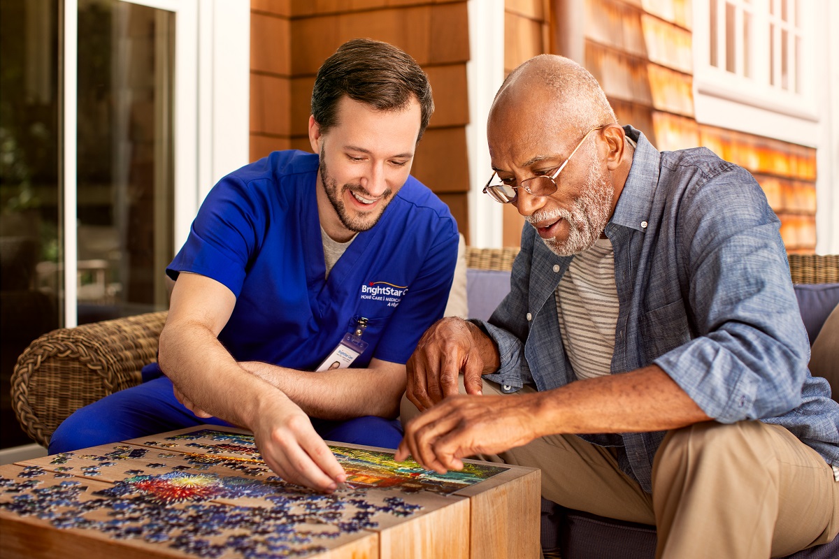 nurse and patient playing puzzles