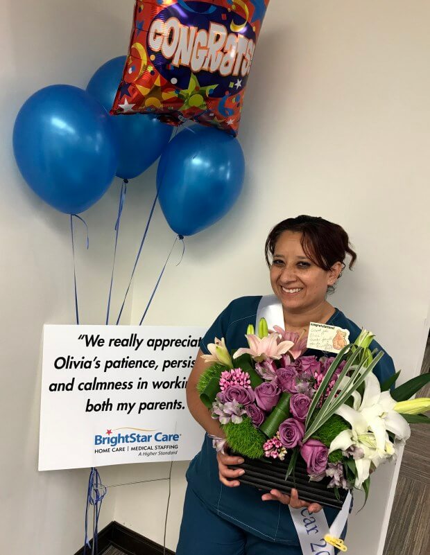 olivia mccarthy caregiver gets awarded