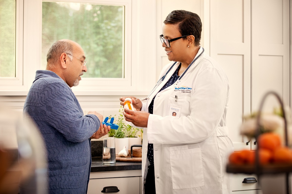 A client consults with the BrightStar Care nurse