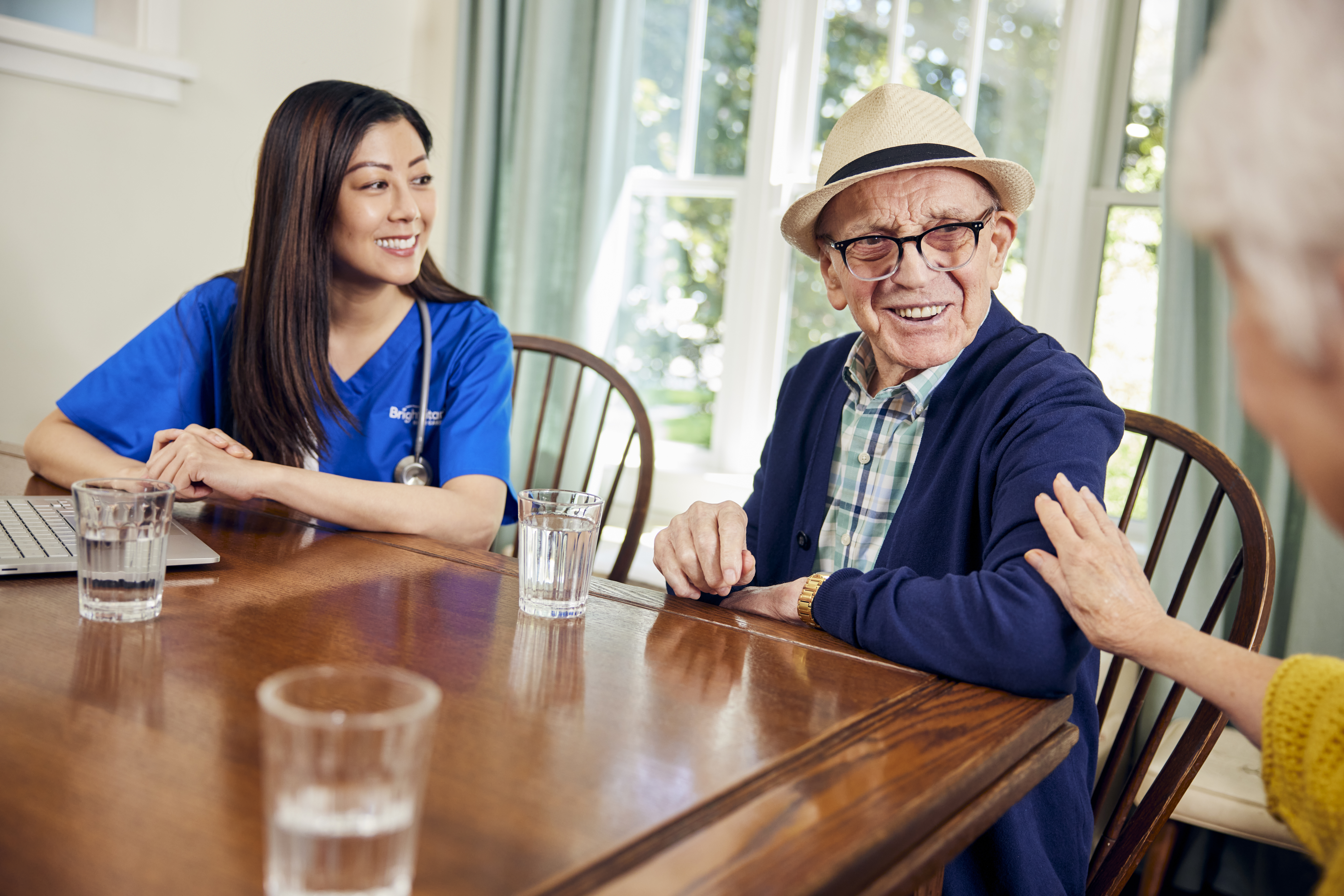 BrightStar Care caregiver helping others