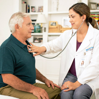 Caregiver helping patient