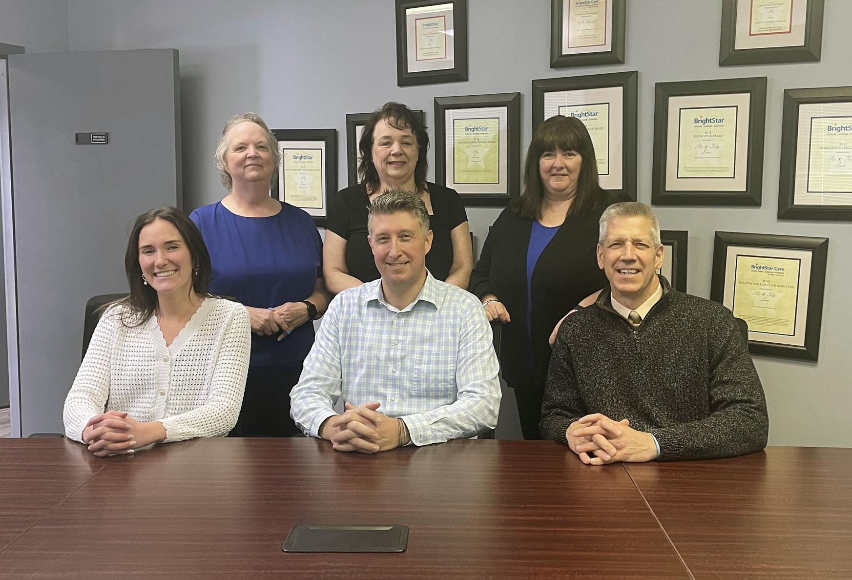 Pat Luers (front right) leads his team at BrightStar Care of Dayton and Centerville. The company employs 100 full- and part- time people. Back row, from left: Kerrie Soares, Julie McCormick, Pam Crabtree. Front row, Lfrom left: Alex Rouse, Matthew Bell, Pa